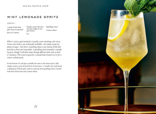 Mint lemonade spritz cocktail in a glass with text on a magazine page.