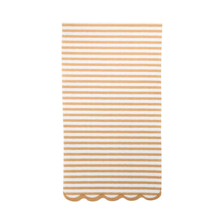 Striped yellow and white fabric with scalloped edge on a white background
