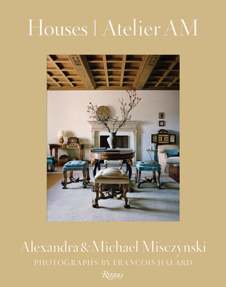 Book cover of 'Houses Atelier AM' with a photograph of an interior design setting.