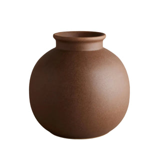 Brown ceramic vase on a neutral background