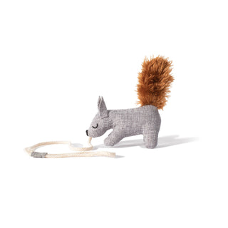 Plush toy squirrel with a brown tail on a white background