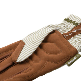 Brown gloves with striped cuffs and Burgon & Ball branding on a white background