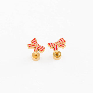 Pair of bow-shaped earrings with gold bases on a white background