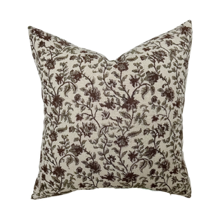 Floral patterned pillow on a white background