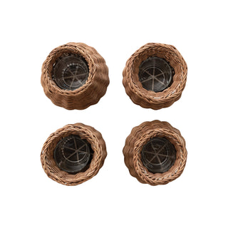 Four woven nest-like structures with central circular openings on a white background