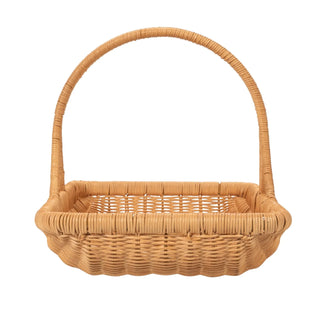 Wicker basket with a handle on a white background