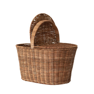 A natural brown woven wicker basket with a rounded top and a single arched handle, shown on a plain white background.