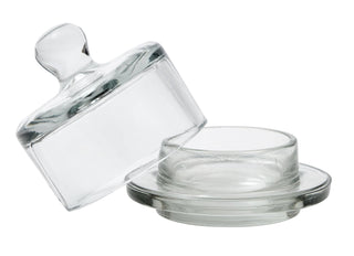Clear glass jar with a lid on a white background
