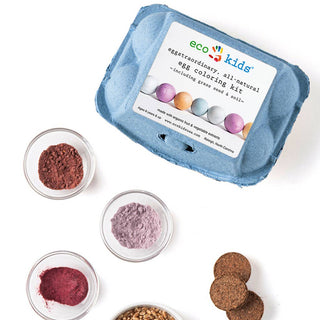 Eco Kids egg dyeing kit with natural dyes and tools on a white background
